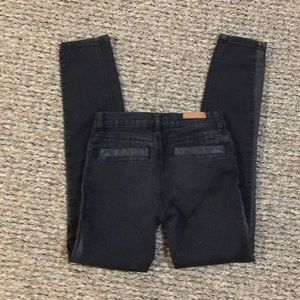 Black skinny jeans with leather detail (Girls)